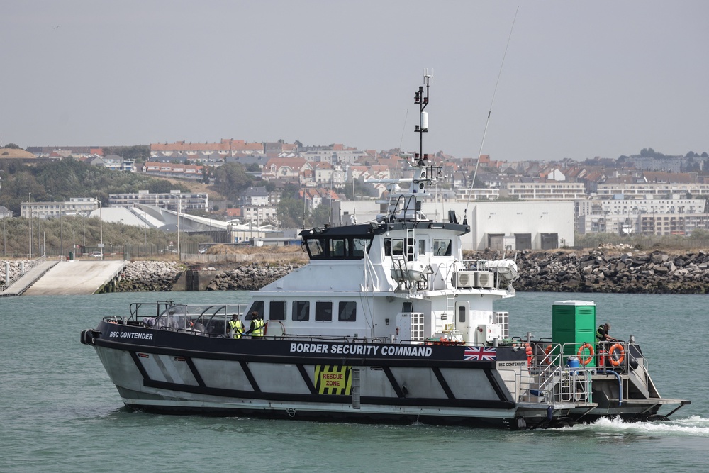 The British rescue ship BSC Contender cruises away after participating in a rescue operation at sea after a migrants' boat caught fire (AFP/Getty)