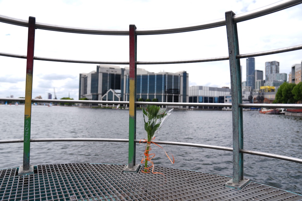A bunch of flowers left by River Thames at Millwall Outer Dock (Ben Whitley/PA) (PA Wire)
