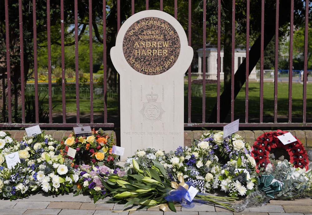 Flowers left next to a memorial stone in Reading, dedicated to the memory of Police Constable Andrew Harper (Andrew Matthews/PA) (PA Wire)