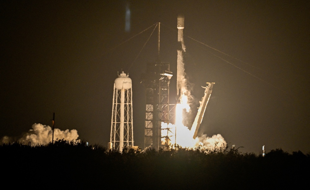 A SpaceX Falcon 9 rocket launches carrying Firefly Aerospace's Blue Ghost lunar lander as the primary payload and Japan-based ispace's Resilience lander as a secondary payload, from Kennedy Space Center in Cape Canaveral, Florida, U.S., January 15, 2025 (Reuters)