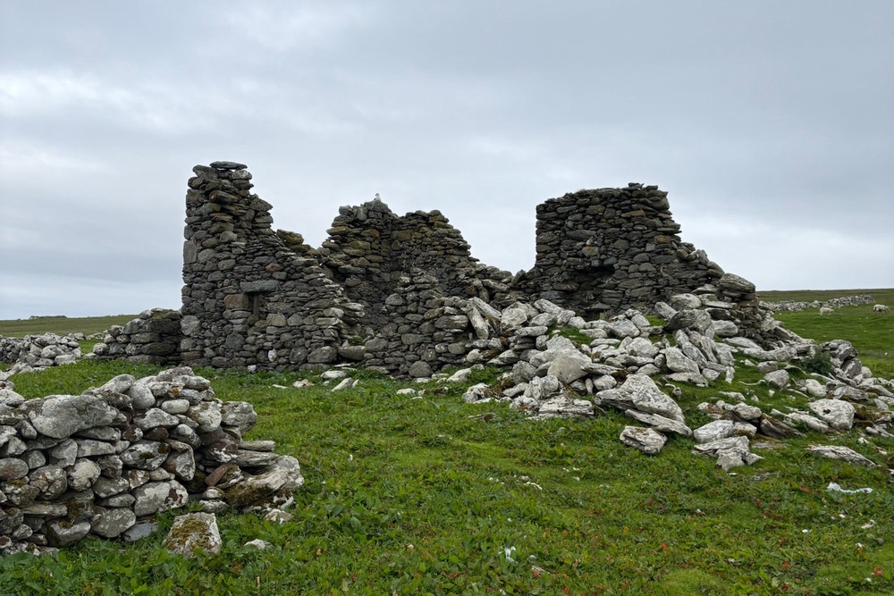 Traditional croft houses on Unst (Amelia Neath/The Independent)