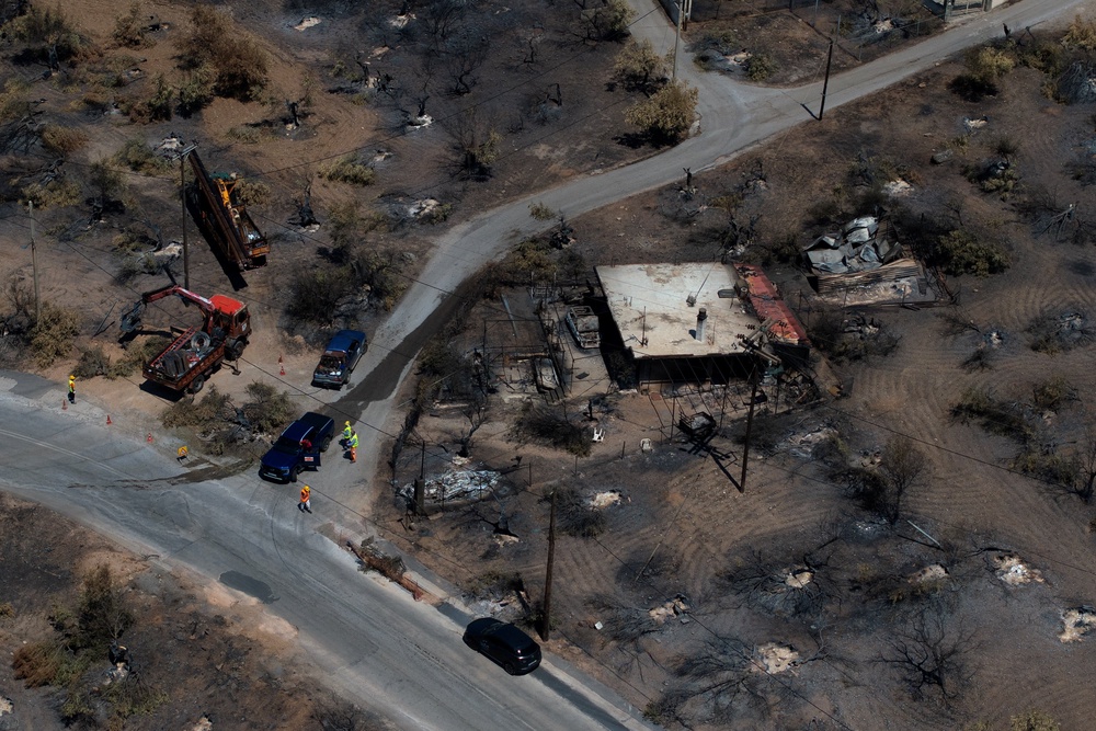 A drone view of a burnt building after a wildfire in Porto Germeno, Greece, 5 August 2026 (Reuters)