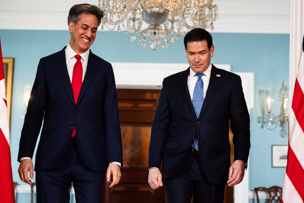 Ed Miliband, left, was invited to the US capital by Marco Rubio, right, after the pair met in the Philippines last month (Tierney L Cross/AP) (AP)