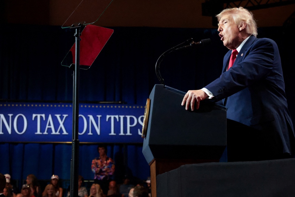 The president used his Vegas speech to tout his economic agenda and brand Democrats as ‘communists’ intent on taking over the country (Reuters)