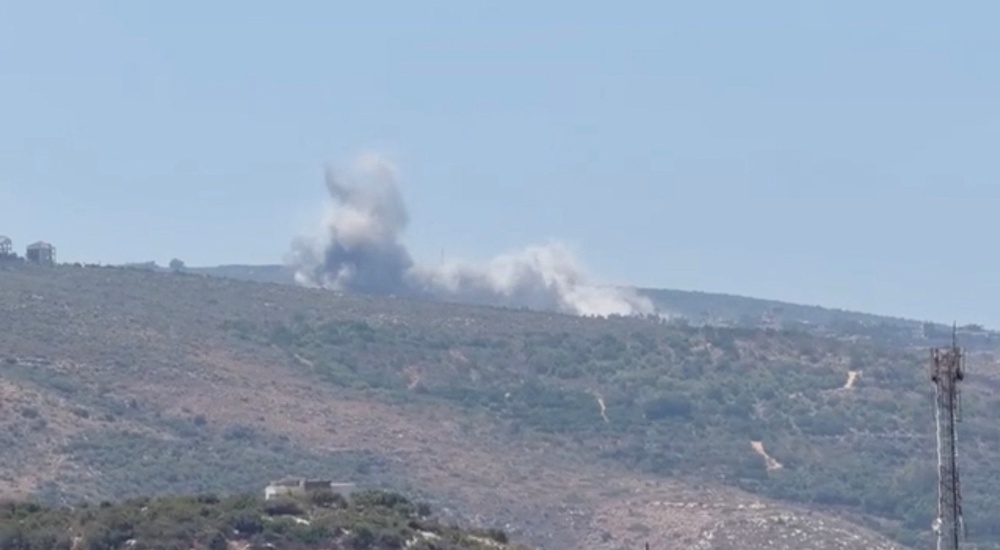 Smoke rises from a hill following Israeli air strikes, after the Israeli military issued an evacuation warning to the village of Mansouri, Lebanon (Reuters)