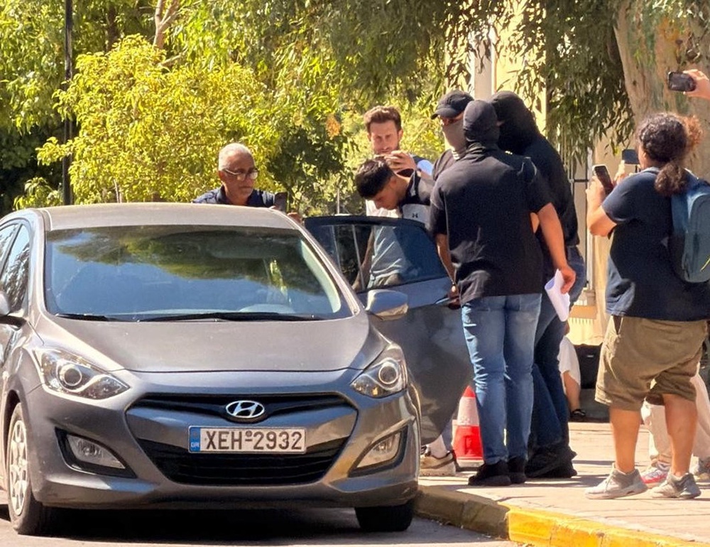 Ahmadzai leaving the court complex in Kypseli, Athens, following his initial appearance on Wednesday. (Nick Forbes/PA)