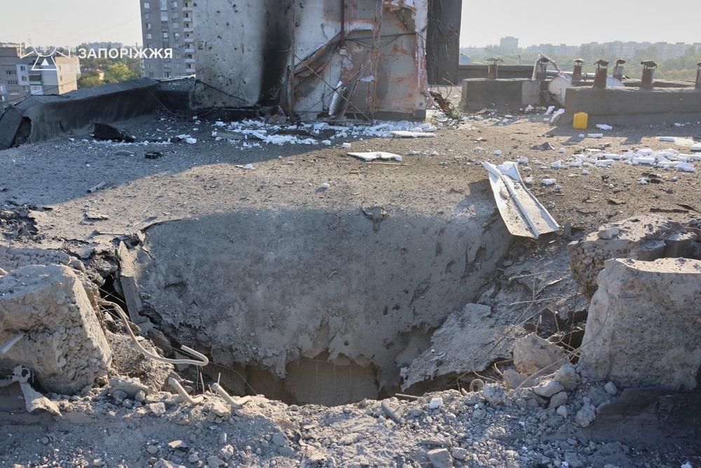 In this photo provided by the Ukrainian Emergency Service, a residential building is damaged following a Russian air attack in Zaporizhzhia, Ukraine, (Ukrainian Emergency Service via AP)