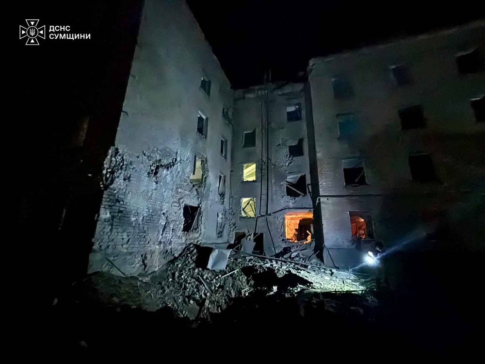 A residential building is damaged following a Russian air attack in Sumy (AP)