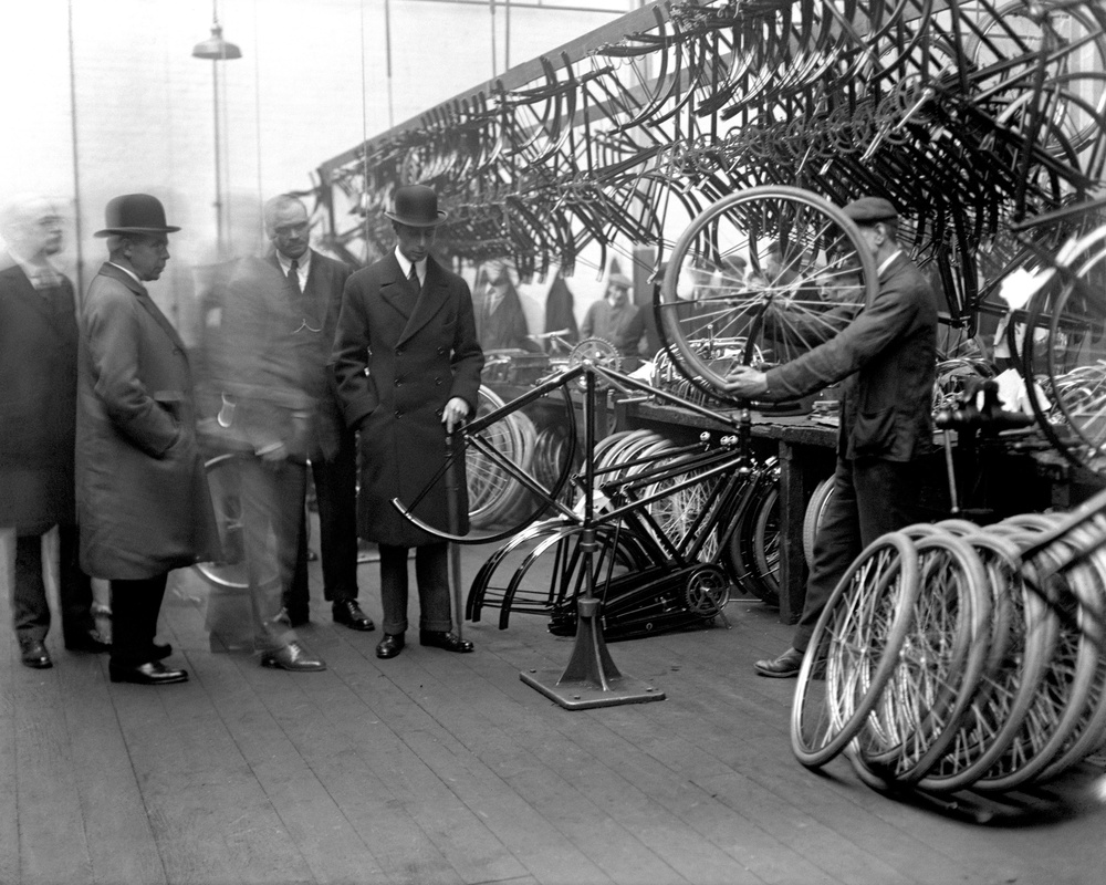 The Duke of York (later to become George VI) watching the assembling of bicycles at the Raleigh factory in Nottingham (Archive/PA) (PA Archive)