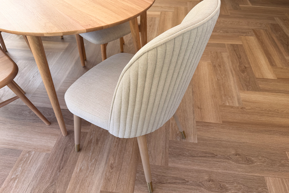 I chose the cool Pebble fabric finish with oak light wood legs, which complement my oak dining table (Emily Peck/The Independent)