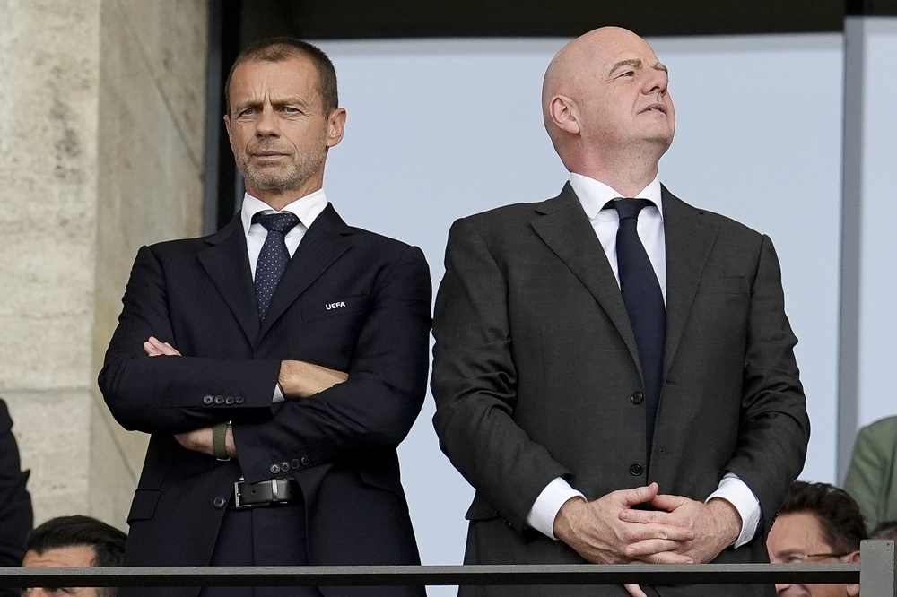 Uefa president Aleksander Ceferin (left) and Fifa counterpart Gianni Infantino (PA)