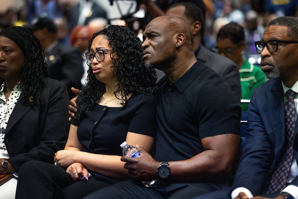Nolan Wells’ heartbroken parents listen to remarks at a news conference about the investigation into his death (Getty)