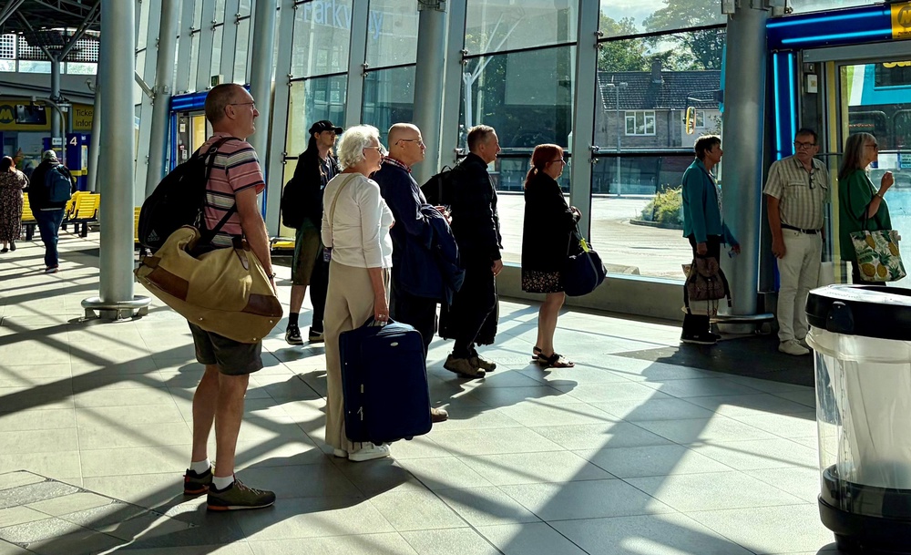Passengers at Liverpool South Parkway station as an electricity supply failure at a communications centre caused major disruption (Peter Byrne/PA) (PA Wire)