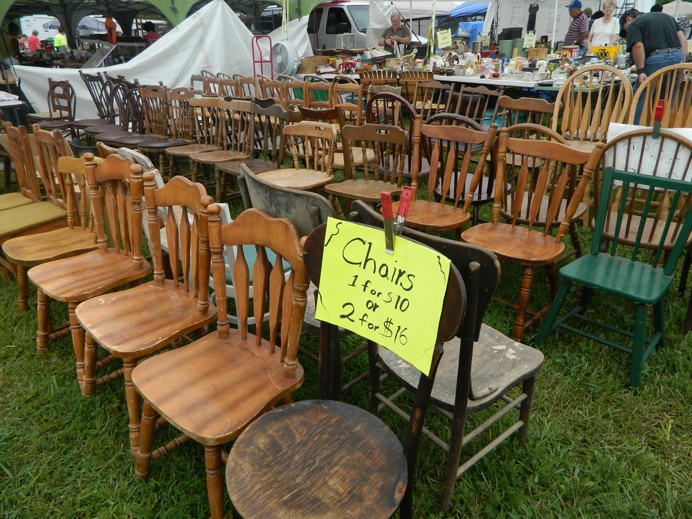 Property owners along the route turn front yards and empty pastures into bustling outdoor markets charging around $25 a day per booth (127 Yard Sale)