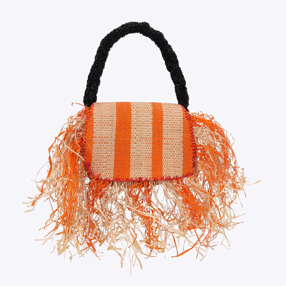 Students at The Creative Corner learn every stage of making, from preparing locally sourced raffia fibres to weaving finished handbags, reconnecting them with the value of craftsmanship. (Copyright: The Creative Corner)