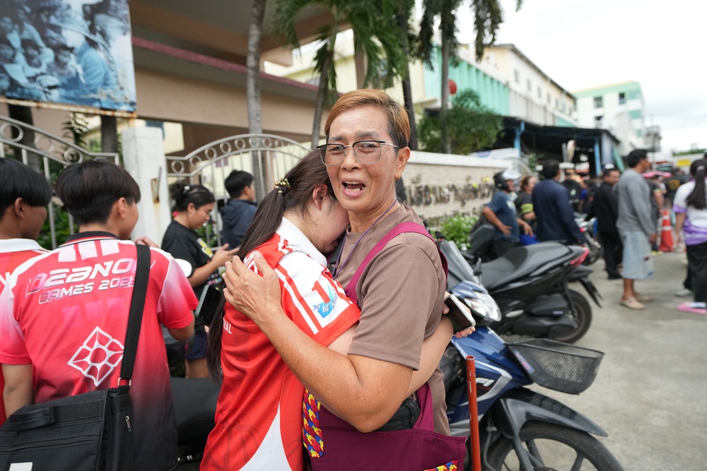 A schoolgirl cries outside her school where deaths and injuries were reported after a shooting in Thailand's Nonthaburi province, Friday (AP)