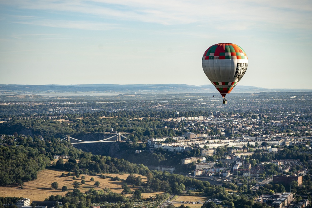 A hot air balloon in the sky over Bristol’s Clifton Suspension Bridge (Ben Birchall/PA) (PA Wire)