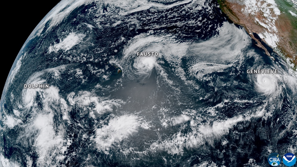 NOAA's GOES West satellite captured this image of three tropical cyclones — Hurricanes Fausto, center, and Genevieve, right, and Typhoon Dolphin — swirling simultaneously in the Pacific Ocean last month. Genevieve turned into a Category 5 storm (NOAA Satellites)