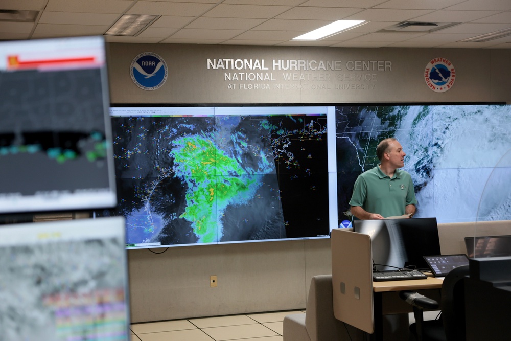 Brad Reinhart, Senior Hurricane Specialist, works on tracking Tropical Storm Arthur at the National Hurricane Center in June in Miami, Florida. NOAA says El Nino has been behind below-normal Atlantic hurricane activity (Getty Images)