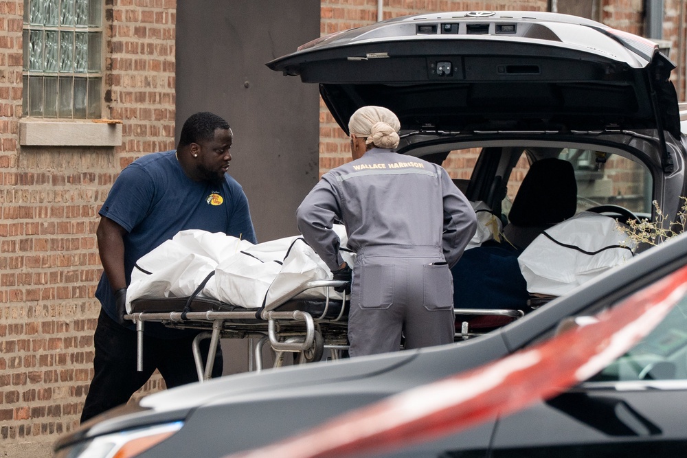 Officials said the conditions at the funeral home were so deplorable that there were maggots on the bodies (Pat Nabong/Chicago Sun-Times via AP)
