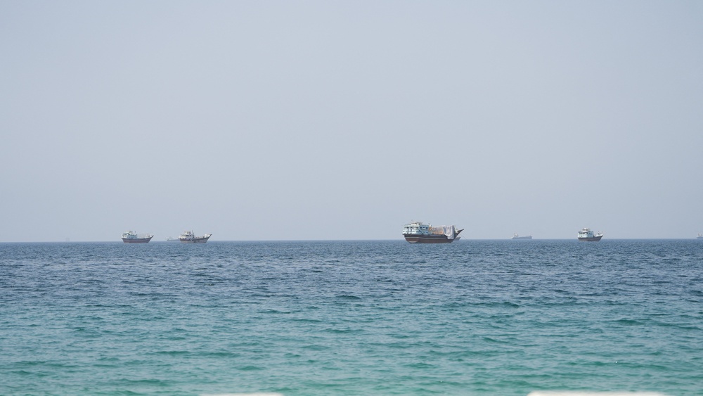 Vessels near the Strait of Hormuz, as seen from Musandam, Oman, August 6 (Reuters)