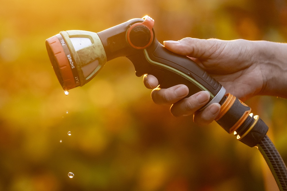 Millions of people in the UK are under hosepipe bans (PA)