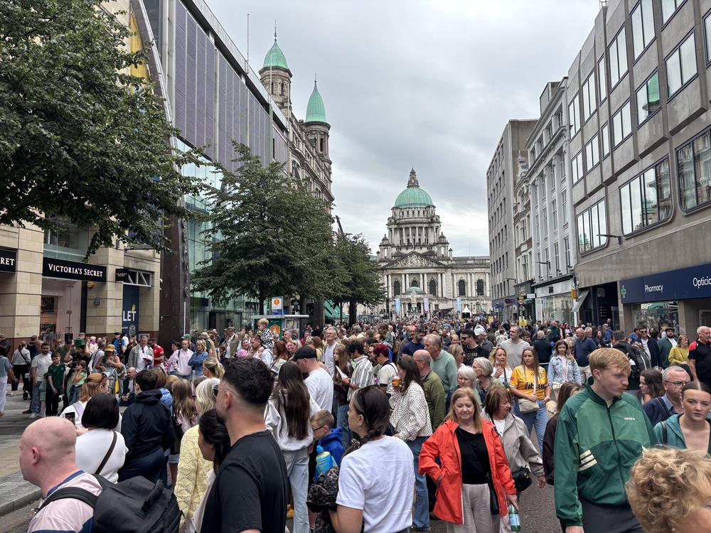 Members of the public watch performers at the Fleadh (Rebecca Black/PA) (PA Wire)
