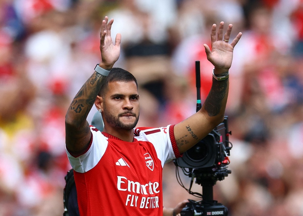 Arsenal new signing Bruno Guimaraes waves to the fans before the match (Reuters)