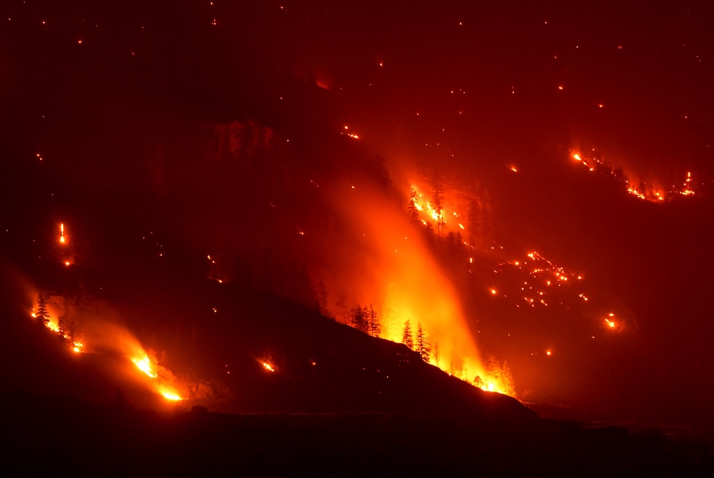 The Bald Range wildfire burns in Summerland, British Columbia late Saturday, Aug. 8, 2026. (Darryl Dyck/The Canadian Press via AP) (AP)