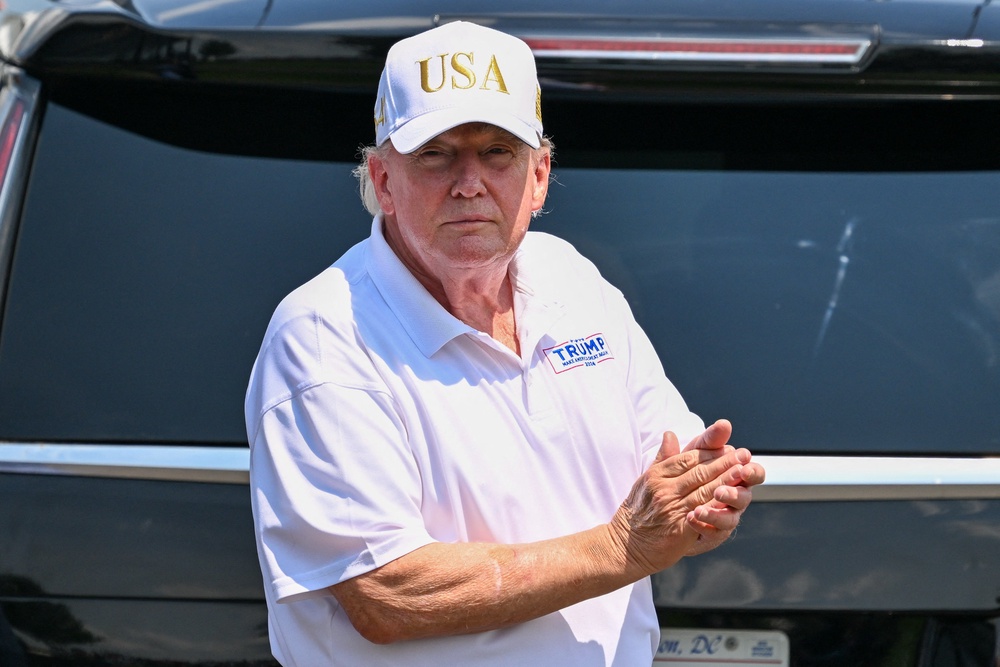 Trump was also pictured over the weekend with markings on his right arm (Reuters)