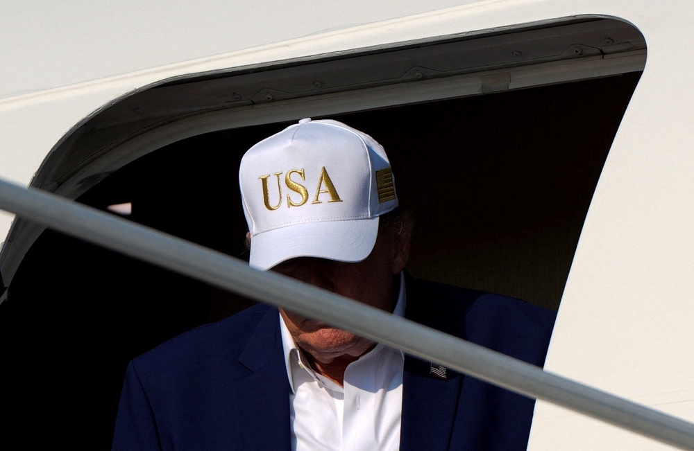 US president Donald Trump disembarks Air Force One at Joint Base Andrews, Maryland, US, 9 August 2026 (Reuters)