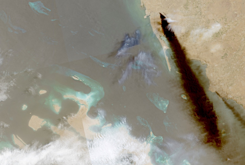 File: A composite satellite image shows trail of smoke rising from an oil facility, in Jizan on 26 July 2026 (Reuters)