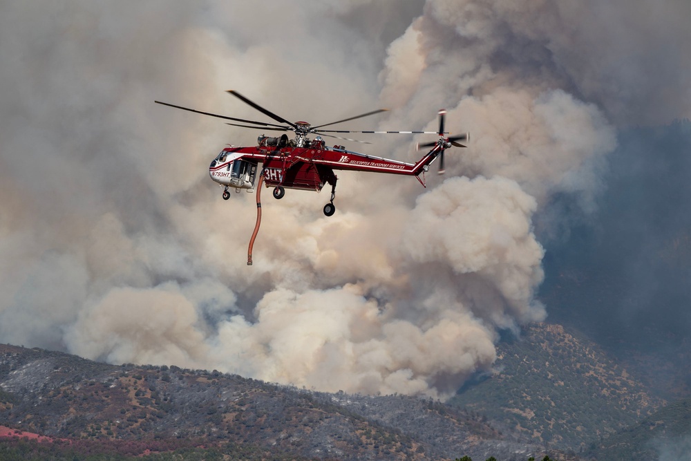 A Sikorsky Skycrane maneuvers into position to refill during efforts to fight the Widemouth 2 Fire east of Fillmore, Utah, on Tuesday, Aug. 4, 2026, before it crashed on Friday, Aug. 7. (Scott G Winterton/The Deseret News via AP) (AP)