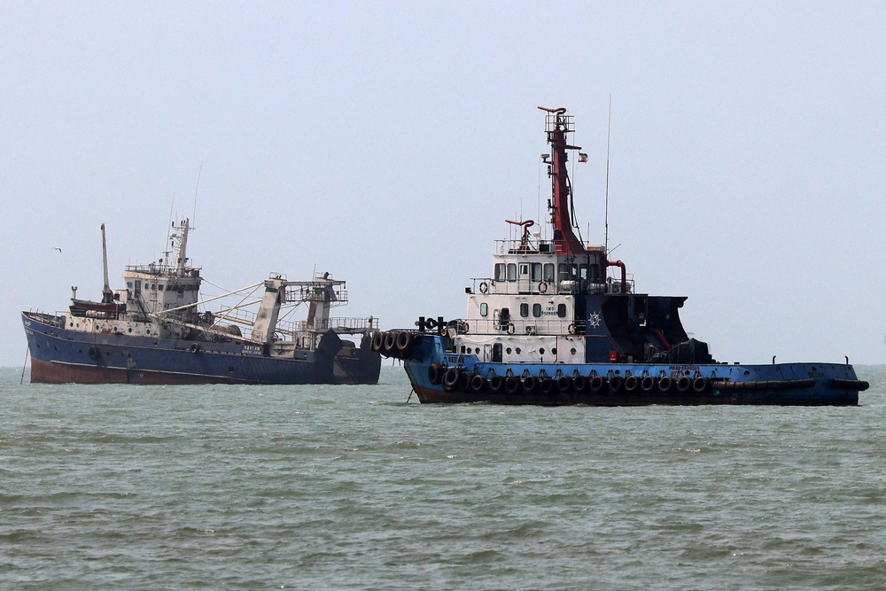 Vessels transit the Strait of Hormuz off Bandar Abbas in southern Iran on August 10 (AFP/Getty)