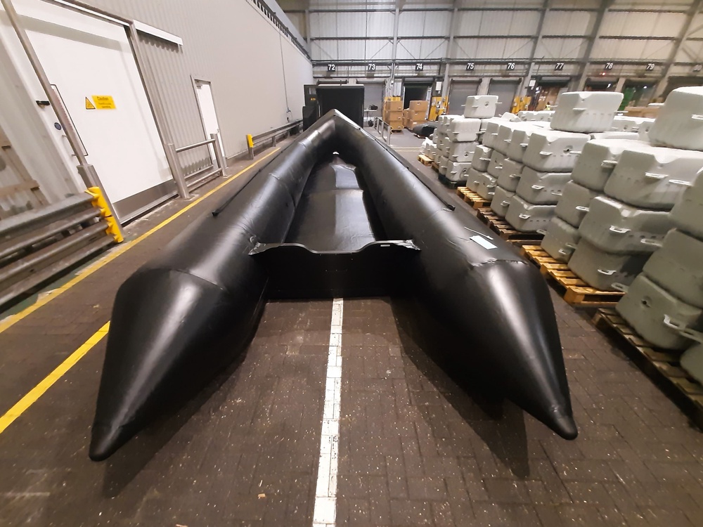 A small boat seized by the NCA in the UK. Dinghies are believed to be produced in China and then sent to Germany for storage and processing. (NCA)