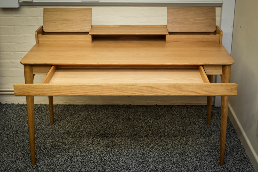 The desk’s storage is one if its selling points (Alastair Jennings/The Independent)