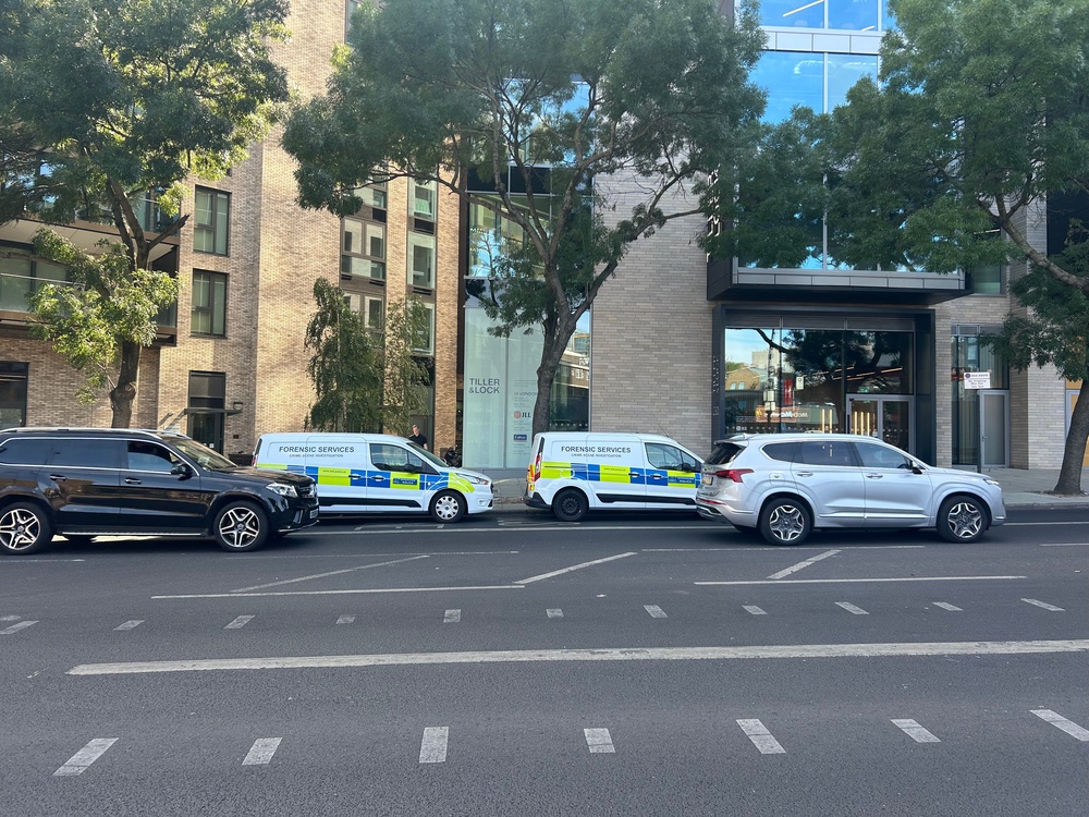 Forensic police vans at the scene at Bollinder Place, Islington (PA)