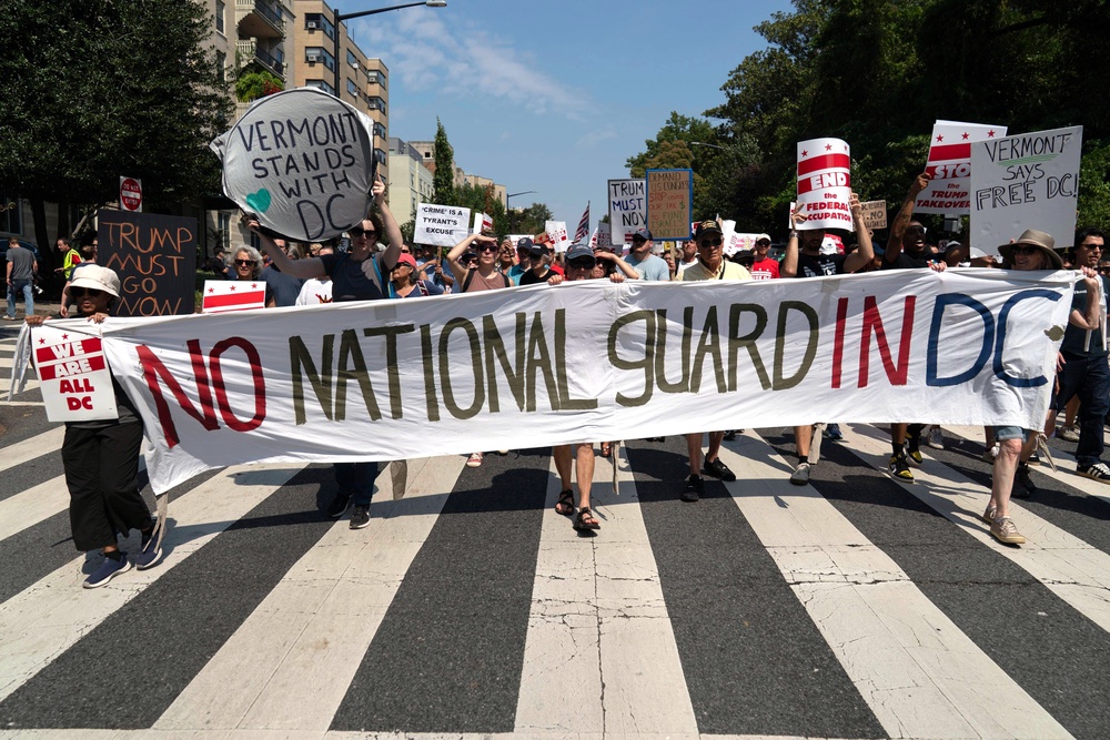 Demonstrators protest against Trump's deployment of federal law enforcement and National Guard troops during a march, Sept. 6, 2025, in Washington (AP Photo/Jose Luis Magana)