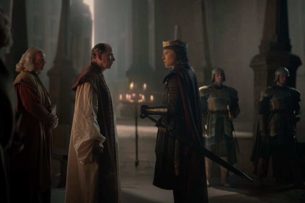 The High Septon (Simon Chandler) faces off against Queen Rhaenyra (Emma D'Arcy) (HBO)
