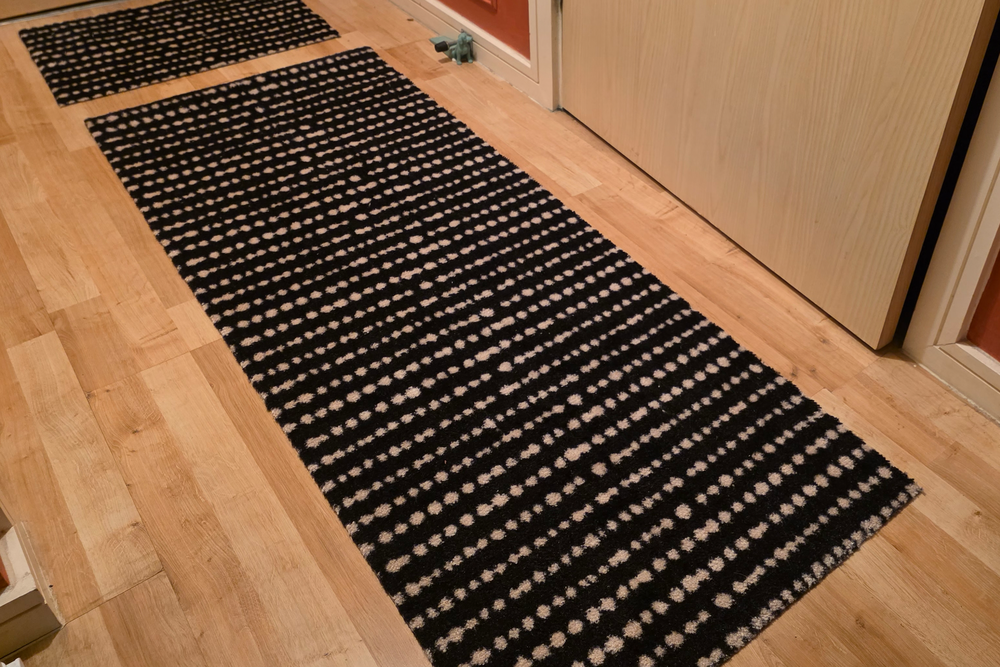 This is a backed hallway mat (Abha Shah/The Independent)
