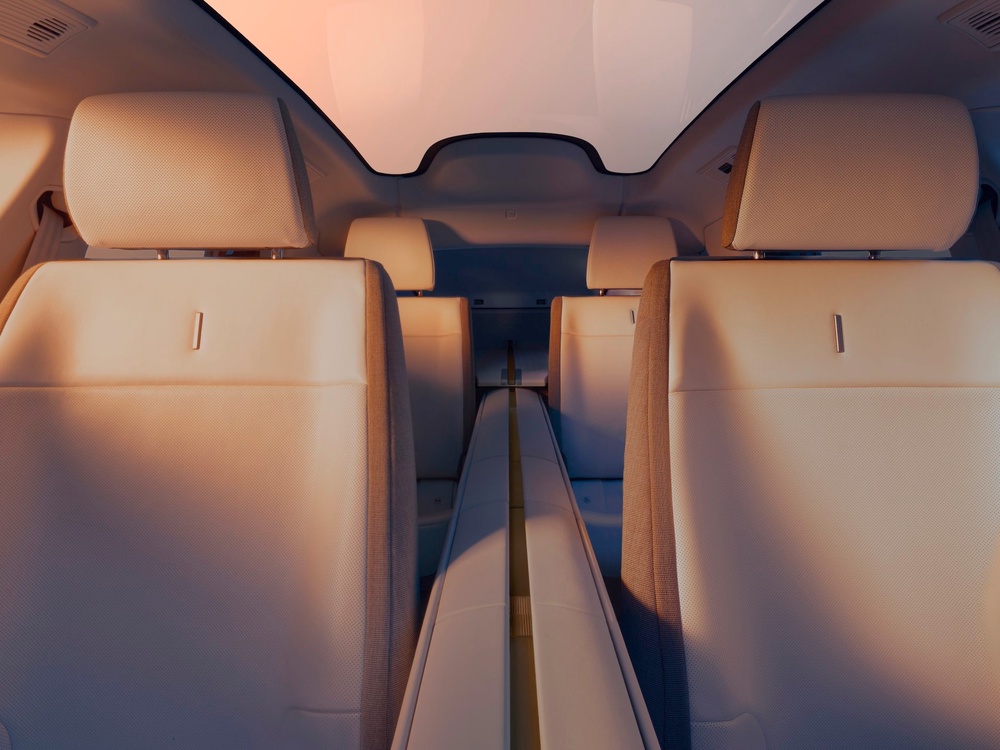 The Jaguar Type 01 features minimalist seats front and rear, a strong brass-trimmed centre spine, a long panoramic glass roof and no rear screen (Jaguar)