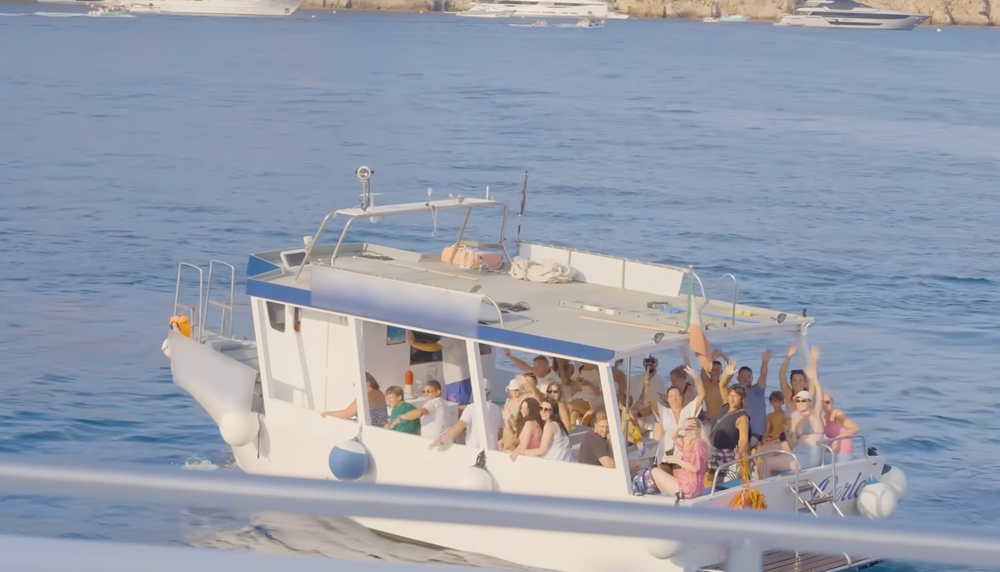 Boats filled with tourists hoping to get a glimpse of Haaland are sailing past his yacht (Erling Haaland/YouTube)