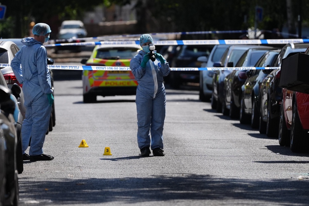 A crime scene was in place on Tuesday with officers in attendance (Jonathan Brady/PA) (PA Wire)