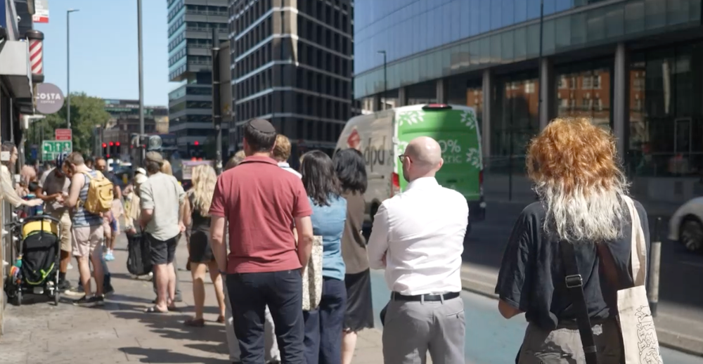 Customers queue outside Am2Pm Convenience shop in Whitechapel for solar eclipse glasses and leave after being told they were temporarily sold out (PA Media)