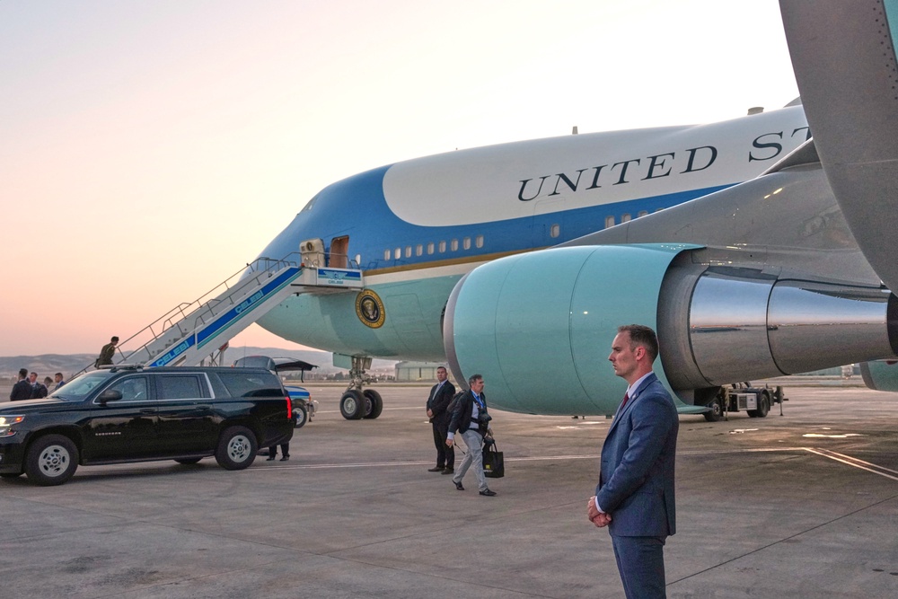 The catering truck used to transport President Trump to the smaller plane in which he secretly left Turkey is seen parked next to the legacy Air Force One at Ankara Esenboga Airport on July 8 (AP)
