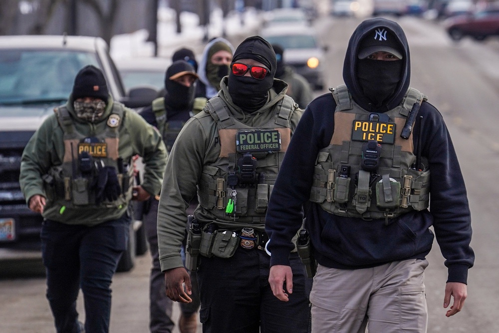 Compliant Technologies says the devices function as a normal pair of patrol gloves until officers press a switch to activate their electrical mode (AP Photo/Ryan Murphy)