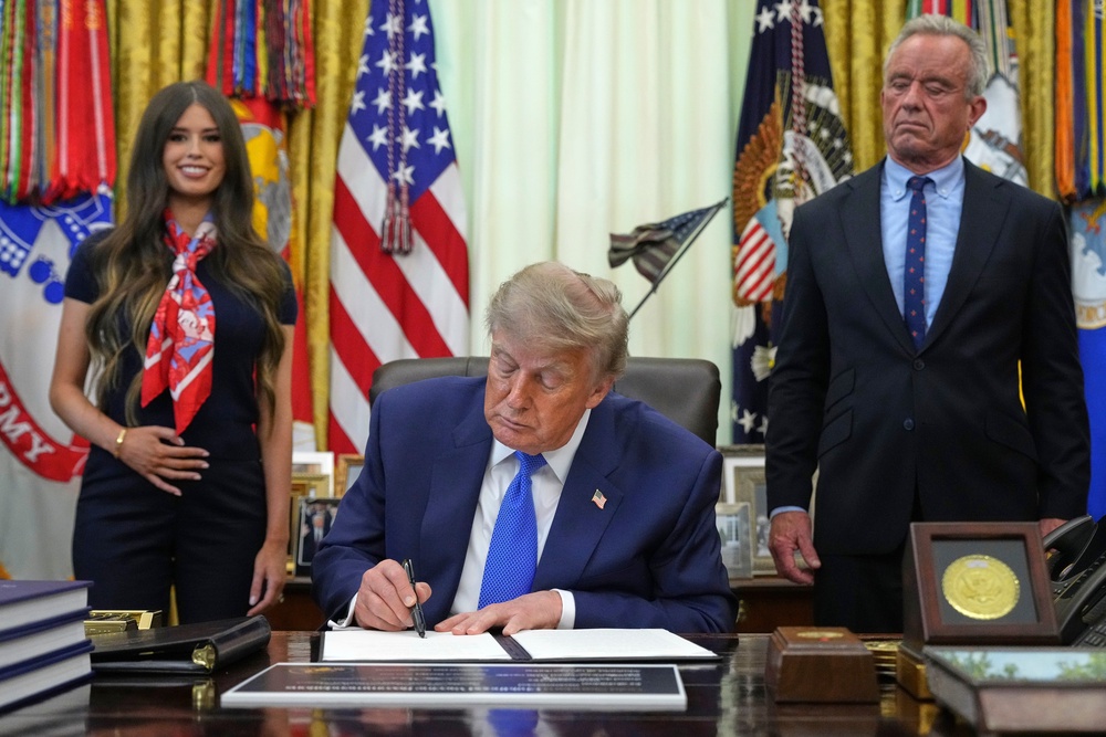 Kennedy with President Donald Trump in the Oval Office this week announcing a major shift in childhood vaccine policy (AP)