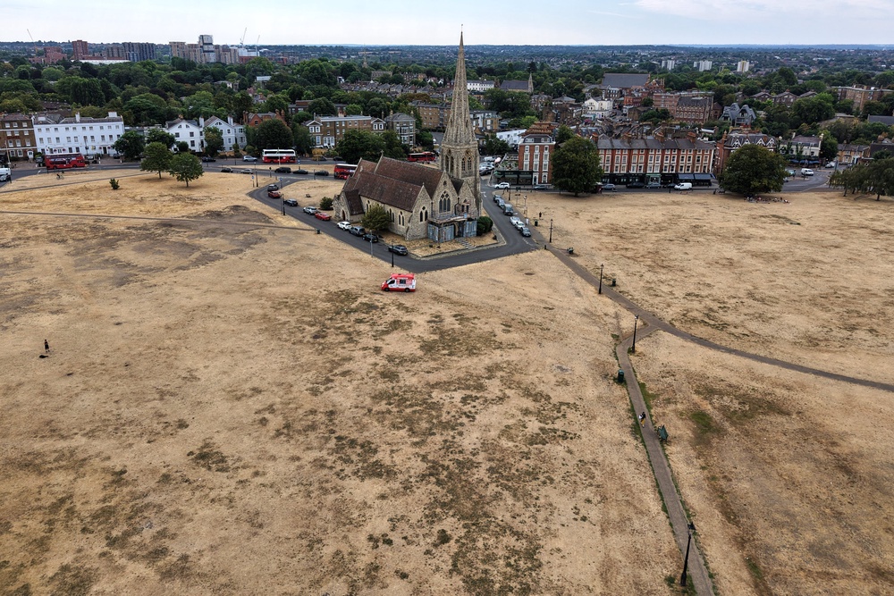 Dried vegetation is seen surrounding the All Saints church in Blackheath, south London (Copyright 2026 The Associated Press. All rights reserved)