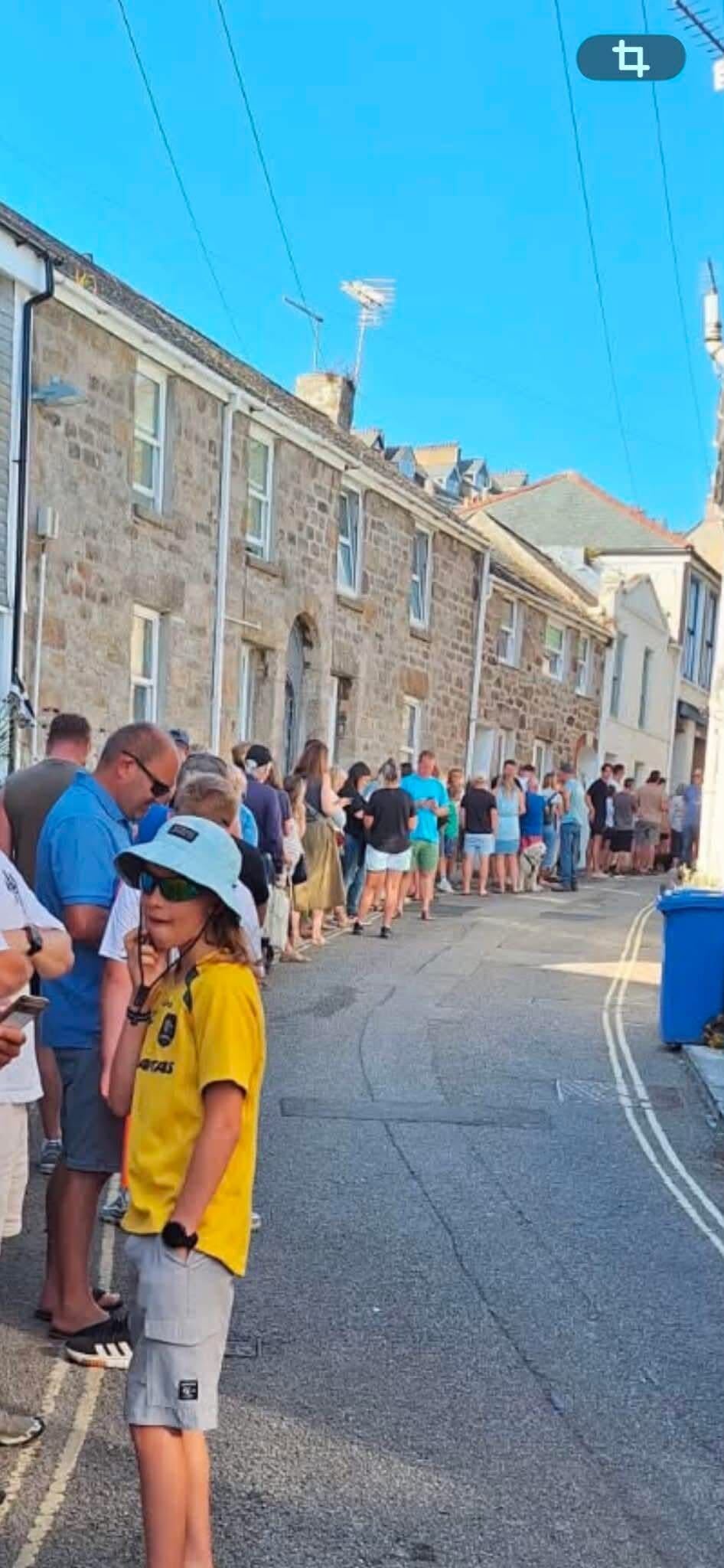 A queue for solar eclipse glasses in St Ives, Cornwall, on 12 August, 2026 (Clive Oxley)