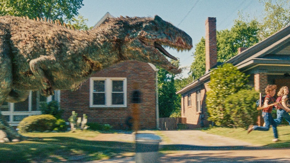 Cretaceous licence: Dinosaurs run amok in ‘The End of Oak Street’ (Warner Bros)